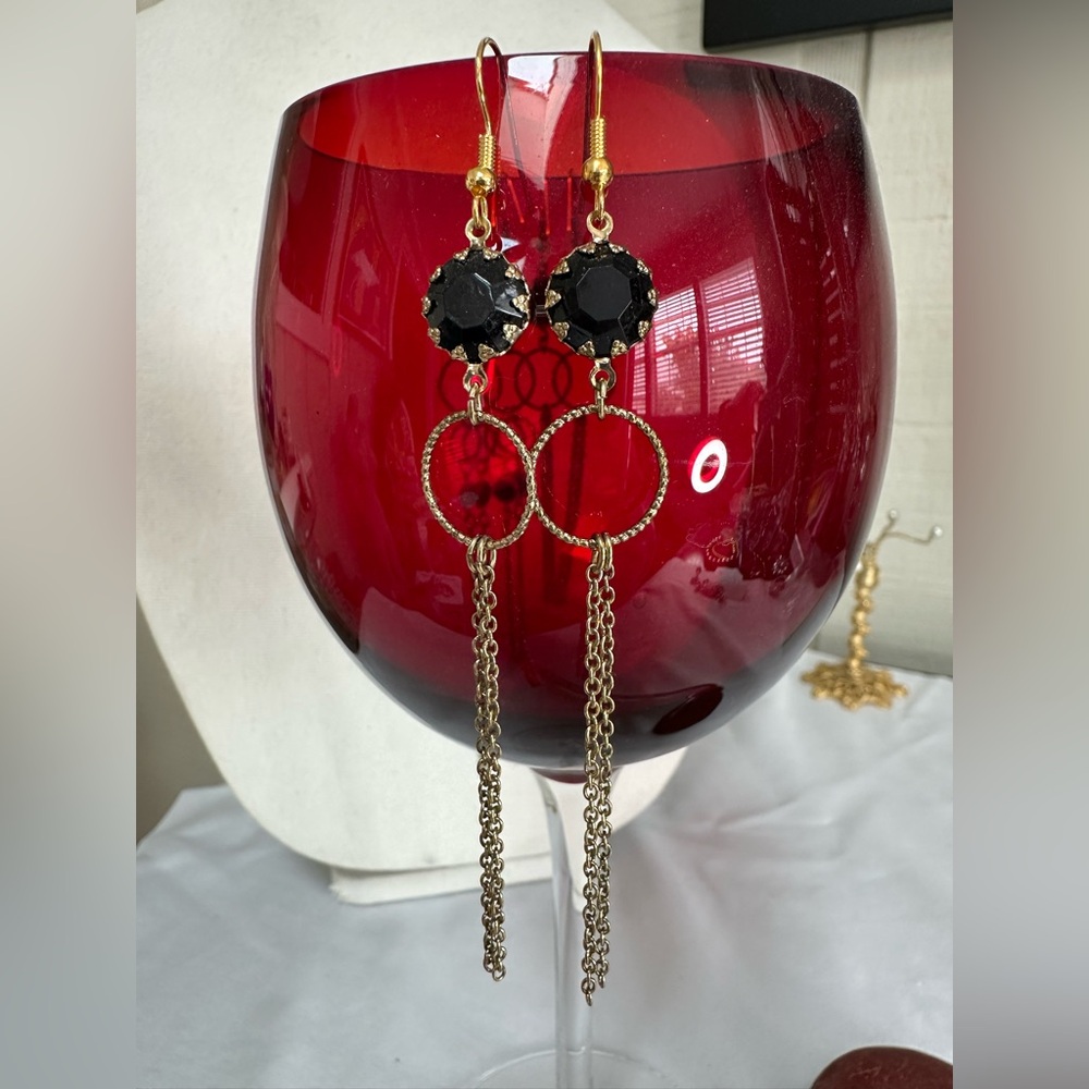 Long goldtone and black bead earrings